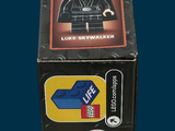 a box with a darth vader figure inside of it