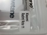 a plastic container with a toothbrush in it