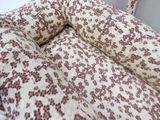 an image of a cat bed with a cat in it