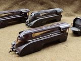 three toy trains that are sitting on a table