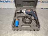 an electric drill in a case with a cord in it
