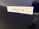 a sticker on the back of a car that says vauto