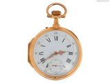 une montre de poche en or avec des chiffres romains sur le cadran