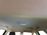 the interior of a car with the sun shining through the window