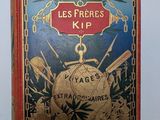 un vieux livre rouge et bleu dont la couverture est bordée d'or