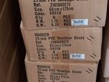 several boxes stacked on top of each other in a room