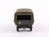 a toy army truck with a flag on the back
