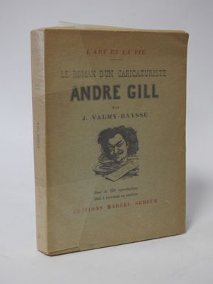 an old book sitting on top of a table next to a white background