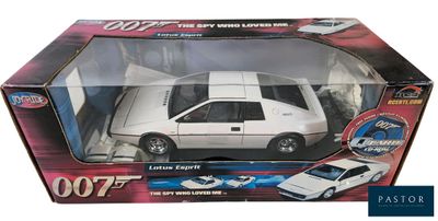 white die - cast toy car in a box on a white background