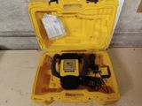 yellow case with tools in it sitting on the floor