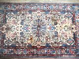 an oriental rug on the floor in a room