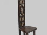 an image of a wooden chair with a carved back and seat
