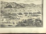 an old book with a picture of a city on it
