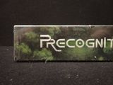 a sign that says recognition on it on a black surface
