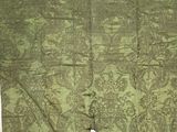 une image représentant un morceau de tissu troué