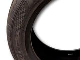 an image of a close up of a tire on a white background