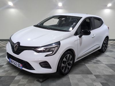 the white car is parked on a checkered tile floor