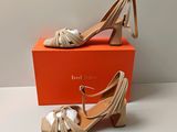 the shoes are on the box and are ready to be worn
