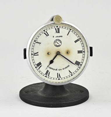 a clock with roman numerals on the face of it
