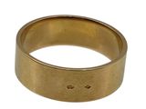 a close up of a gold ring on a white background