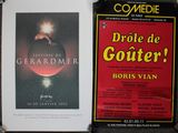 two movie posters on the table next to each other