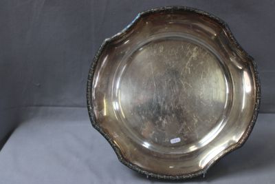 a silver plate that is sitting on a table