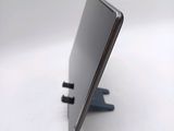 a close up of a cell phone on a stand