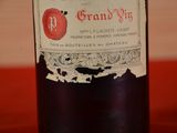 a bottle of wine that is sitting on a table