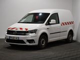 the white van is parked in a room with a checkered floor