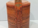 a large wooden box with a design on it