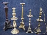a lot of candles that are sitting on a table