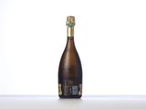 a close up of a bottle of champagne on a table