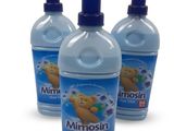trois bouteilles de liquide « Mimosi Blue » avec un bouchon bleu