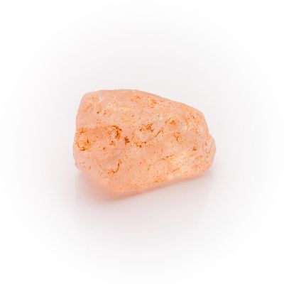 a close up of a rock on a white surface