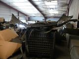 a large pile of junk inside of a building