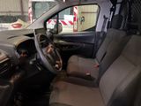 a view of the inside of a vehicle from the driver ' s seat