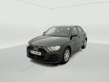 the car is parked in a white room with a white floor