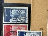 several different stamps are on a piece of paper with writing on them