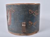 an old wooden box with a painting on it