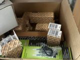 a cardboard box with a bunch of items inside of it