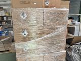 a stack of boxes sitting on top of a pallet in a warehouse