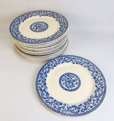 six blue and white plates with floral designs on them