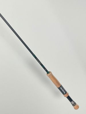 a close up of a golf club on a white surface