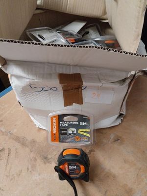 a box that has a corded cord in it and a corded cord in the box