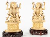 paire de figurines chinoises en ivoire sculpté représentant des bouddhas