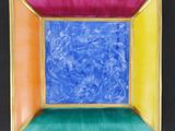 an image of a picture of a colorful plate on a black surface