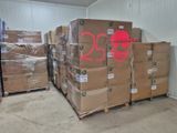 a lot of boxes that are stacked up in a warehouse