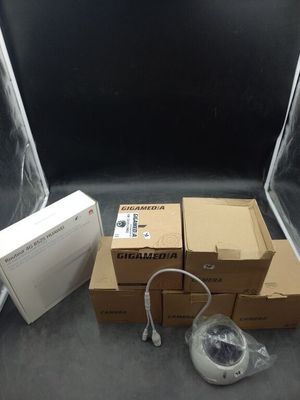 many boxes of electronic equipment sitting on the floor