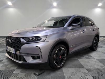the new dsx suv is parked in a showroom