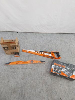 a couple of tools that are laying on the floor
